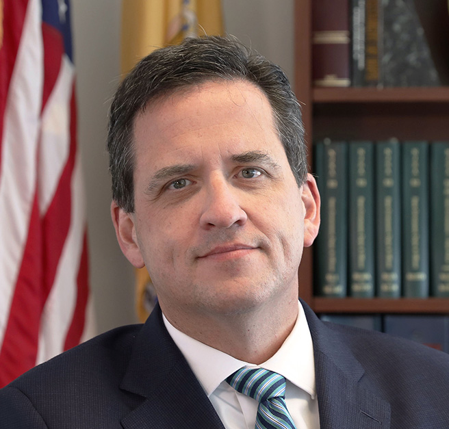 photo: portrait of Acting State Comptroller Kevin Walsh